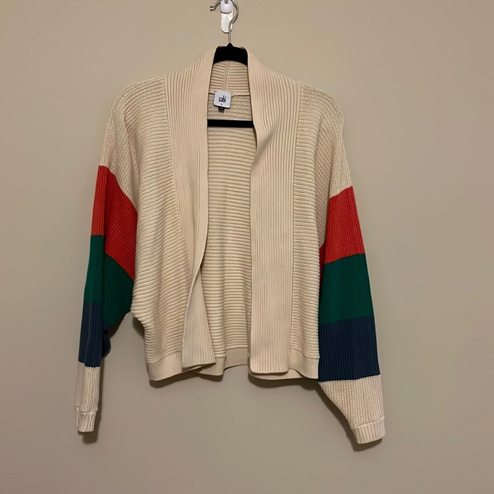 Small tan cabi cardigan with multicolored sleeves.